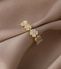 Elegant Adjustable Gold Ring with Flowery Zirconia Finesse - Madeleine