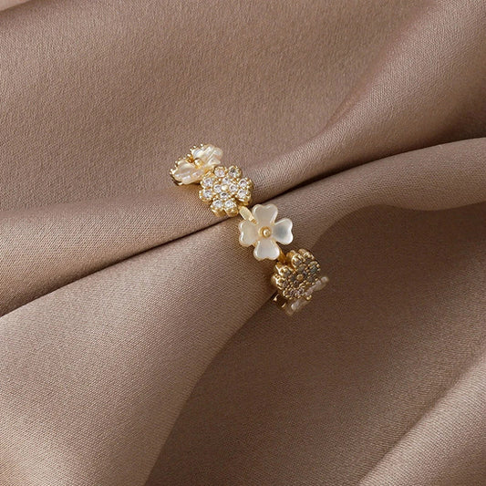 Elegant Adjustable Gold Ring with Flowery Zirconia Finesse - Madeleine