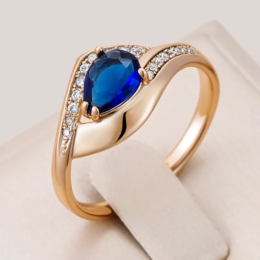 Chic Gold Ring with Dazzling Blue Crystal -Randi
