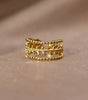 Marissa - Golden ring with superimposed leaves