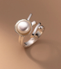 Chic ring in delicate pearls with open design - Olga