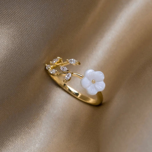 Elegant Adjustable Gold Ring with White Petal and Zirconia Sparkle - Evelyn