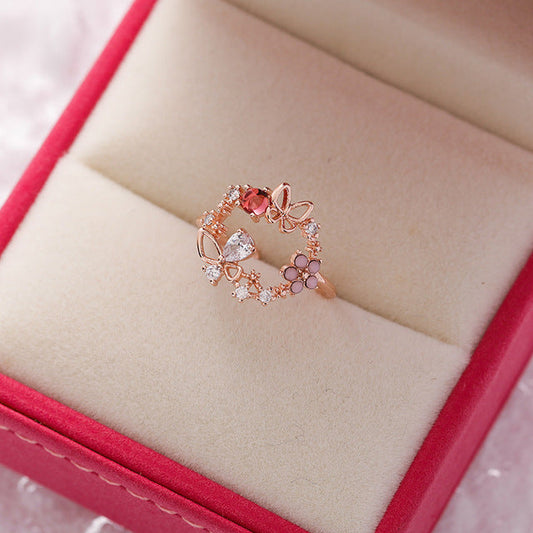Adjustable Gold Ring with Zircon Brilliance and Dazzling Red Stone - Nilssen