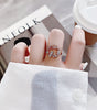 Adjustable Gold Ring with Zircon Brilliance and Dazzling Red Stone - Nilssen