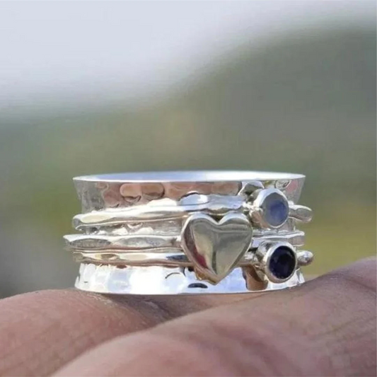 Elegant sterling silver ring with rotating heart - Emilie
