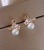 Elegant Cubic Zirconia sparkle and bewitching pearls - Birdie
